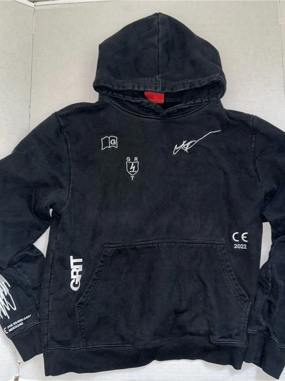 True Grit Black Pullover Hoodie with White Graphics